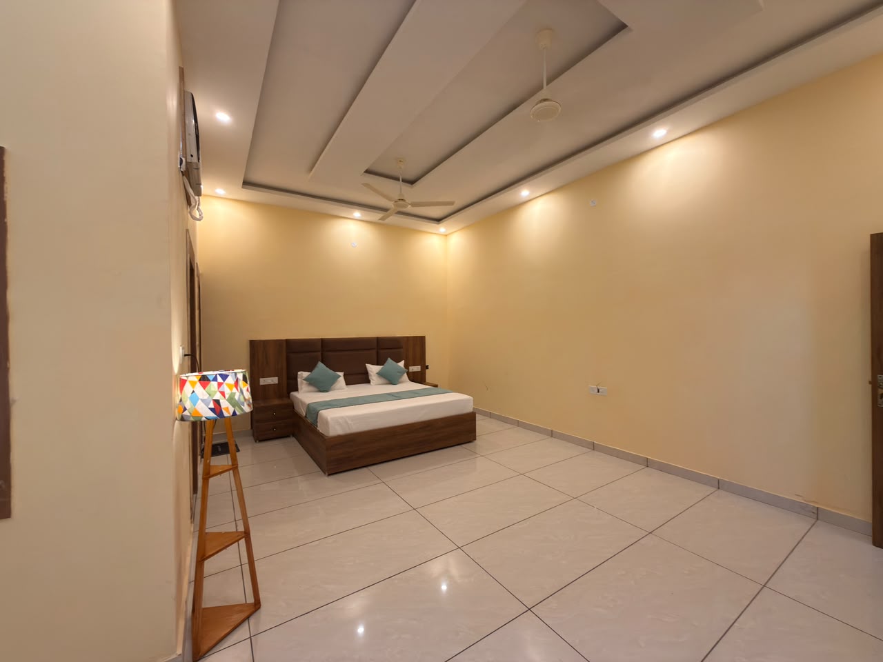 Guest room seating area at Vedic Portico Hotel